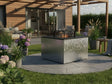 CUBY Feuergrill aus verzinktem Stahl im runden Terrassenbereich mit Gartendesign